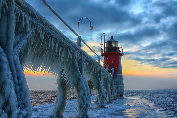 Frozen St. Joseph North Pier Lighthouse, Michigan, USA
