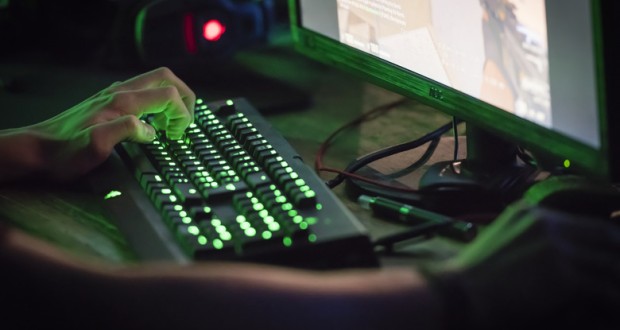 A tilted keyboard is seen as a PC player plays Valorant